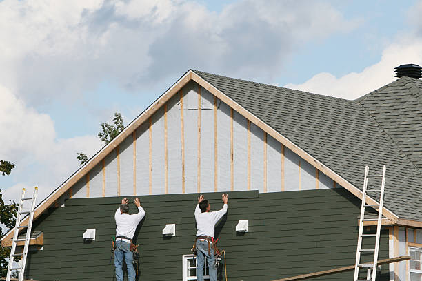 Professional Emergency Siding Repair technician working in Elizabethville, PA